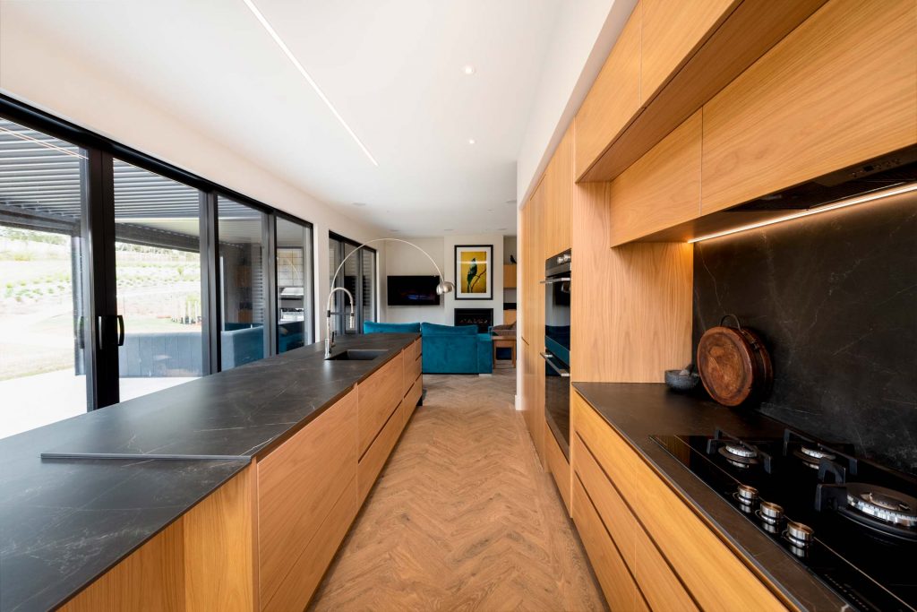 Kitchens-By-John-Prosser-Auckland-Blatch-Wooden-Kitchen-Black-Granite