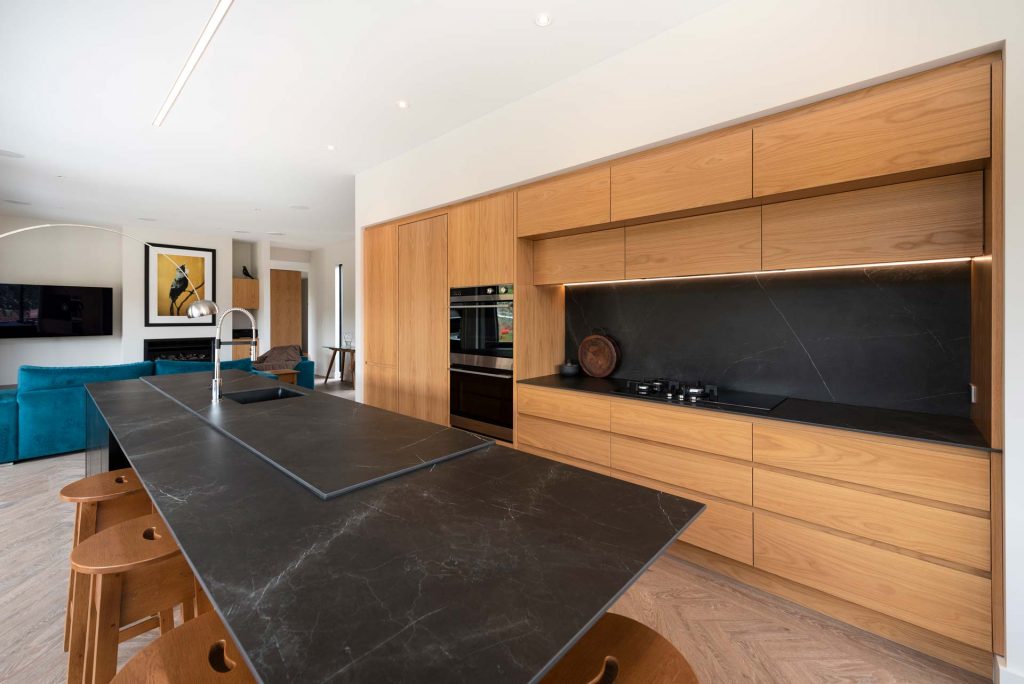 Kitchens-By-John-Prosser-Auckland-Blatch-Wooden-Kitchen-Cabinetry-Black-Granite-Bench