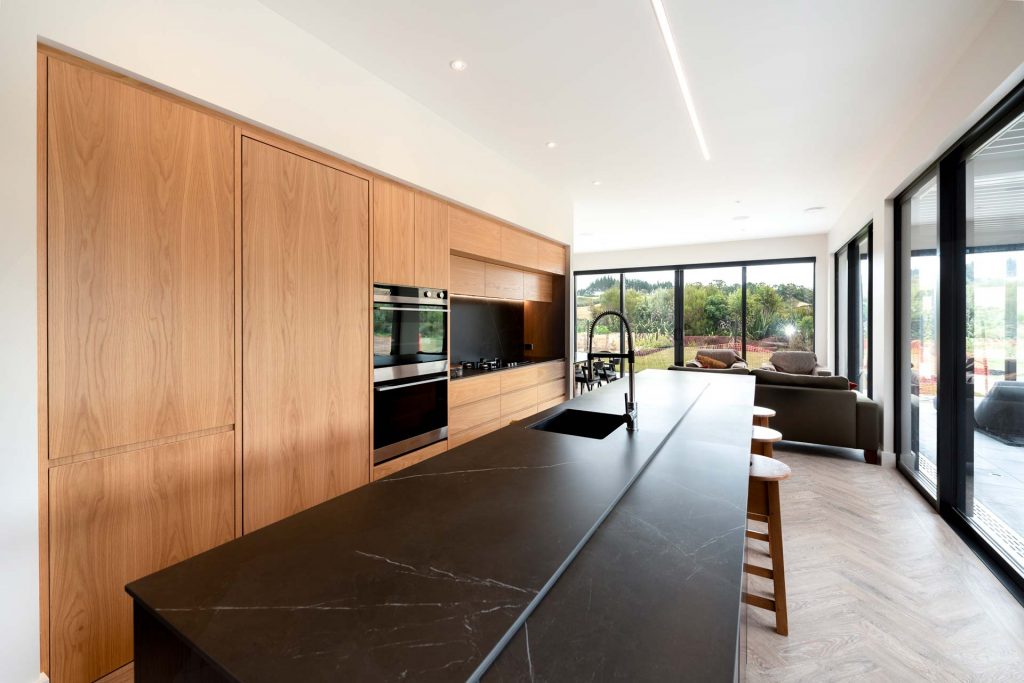 Kitchens-By-John-Prosser-Auckland-Blatch-Wooden-Kitchen-Cabinetry-Black-Granite-Kitchen