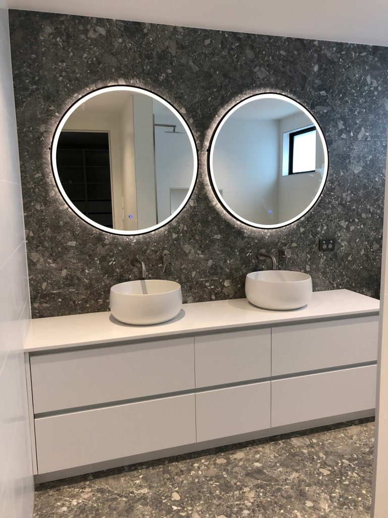 Kitchens-By-John-Prosser-Auckland-Bathrooms-Renovation-Sink-Dark-Marble-Back-Lit-Mirrors-Sink-On-Bench